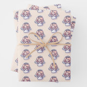 Engelen bidden op roze achtergrond inpakpapier (In situ)