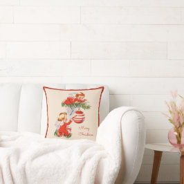 Engelen versieren het kussen van de kerstboom