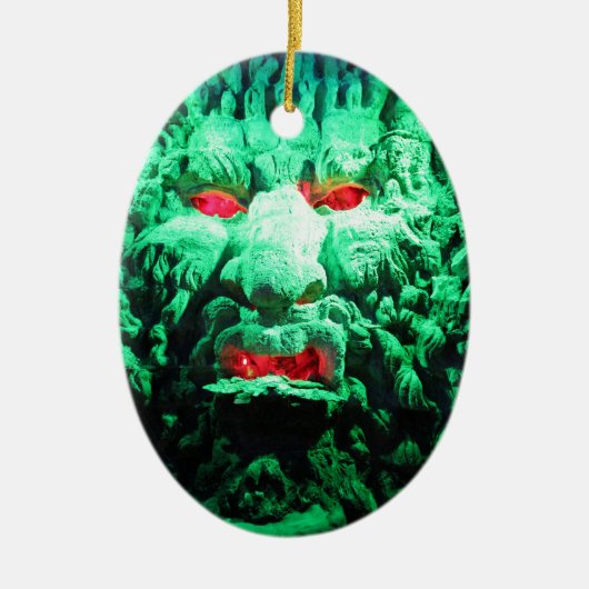 Engelengezicht in rotswand keramisch ornament (Voorkant)