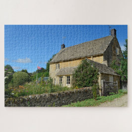 Engels huisje met tuin en vlag legpuzzel