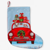 Engelse bulledog in auto met kerstman kleine kerstsok (Voorkant)