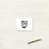 Engelse leraren krijgen een lesje post-it® notes (Op bureau)