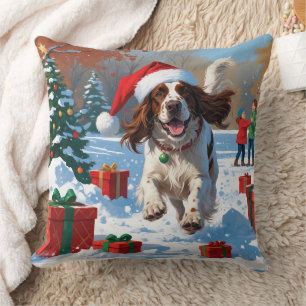 Engelse Setter rent door sneeuw met kerstmuts Kussen