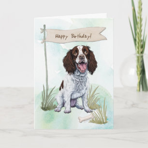 Engelse Springer Spaniel hond onder verjaardagsbor Kaart