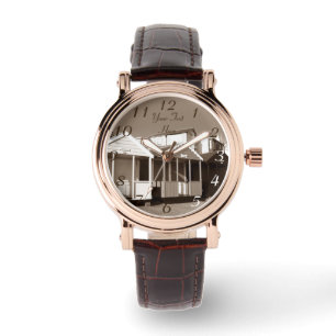 engelse zee - blauwe skies en strandhutten horloge