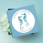 Envelope Seal Sticker, Blue Seahorse Beach Wedding Ronde Sticker<br><div class="desc">De gepersonaliseerde Seahorse Beach Wedding Stickers met de namen van de bruid en de bruidegom en de trouwdatum kenmerkt een replica van mijn oorspronkelijke waterverf kunstwerk in schaduwen van blauw en turquoise. Matching Stationery, Bridal Shower Invitations, Save the Date Cards, Bridesmaid to be Request Cards, Bedankt Cards en andere Wedding...</div>