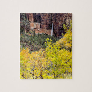 Ephemeral waterfall pours out-out in cliff legpuzzel