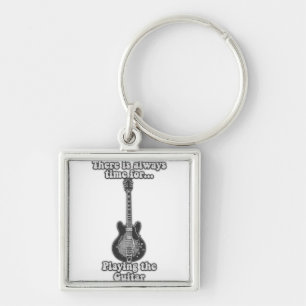 Er is altijd tijd om gitaar te spelen. B&W Sleutelhanger