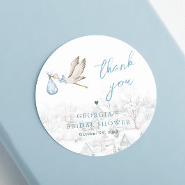 Er is een Village Stork Winter Boy Baby shower Ronde Sticker
