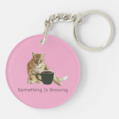 Er wordt roze acryl Sleutelhanger gebrouwen (Achterkant)