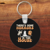 Er zijn een paar verschrikkingen in dit Huis... Sleutelhanger (Voorkant)