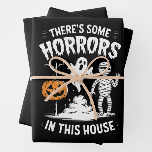 Er zijn enkele verschrikkingen in dit huis grappig inpakpapier vel (In situ)