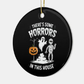 Er zijn enkele verschrikkingen in dit huis grappig keramisch ornament (Links)