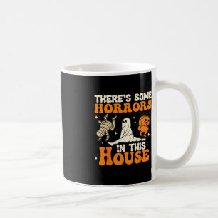 Er zijn enkele verschrikkingen in dit huis Hallowe Koffiemok