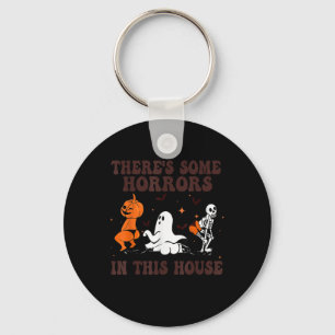 Er zijn enkele verschrikkingen in dit huis Hallowe Sleutelhanger