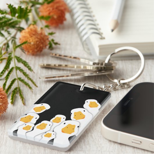 Erie Surveillance: Ganzentoezicht vanuit de ruimte Sleutelhanger (Voorkant Rechts)