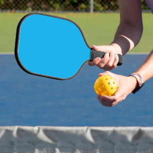 Ervaar de schoonheid van een blauwe hemel met een  pickleball paddle