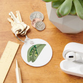 erwten in een peul sleutelhanger