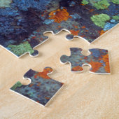 Espenblad op een met korstmos bedekte rots legpuzzel (Zijkant)