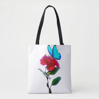 Esthetische blauwe vlinder op rode bloem tote tas