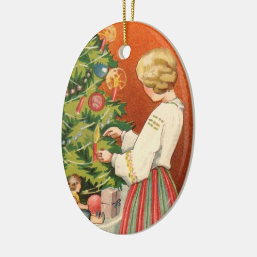 Ests meisje bij kerstboomversiering keramisch ornament (Links)