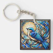 Etherische blauwe vogel neergestreken op raam sleutelhanger (Voorkant)