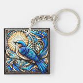 Etherische blauwe vogel neergestreken op raam sleutelhanger (Achterkant)