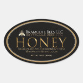 Etiket goud op het etiket van ovale honing op zwar (Voorkant)