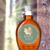 Etiket op groene mantel met suikermapelleder