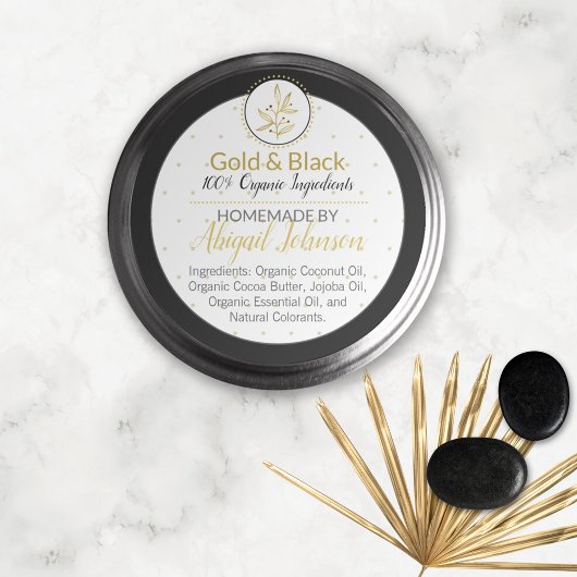 Etiket op zwart/goudhamer of op lichaamstanker