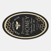 Etiket van ovale honing met honingraat en heraldis (Voorkant)
