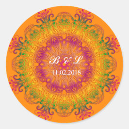 Etnische florale mandala op oranje achtergrond. ronde sticker