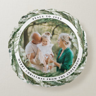 Eucalyptuskerstmis met bladerbes rond kussen