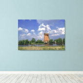 Europa, Nederland, Kinerdijk. Een windmolenzits Canvas Afdruk (Insitu (Houten vloer))
