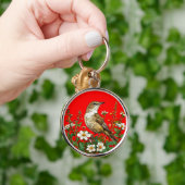 Europese rietzanger sleutelhanger (Hand)