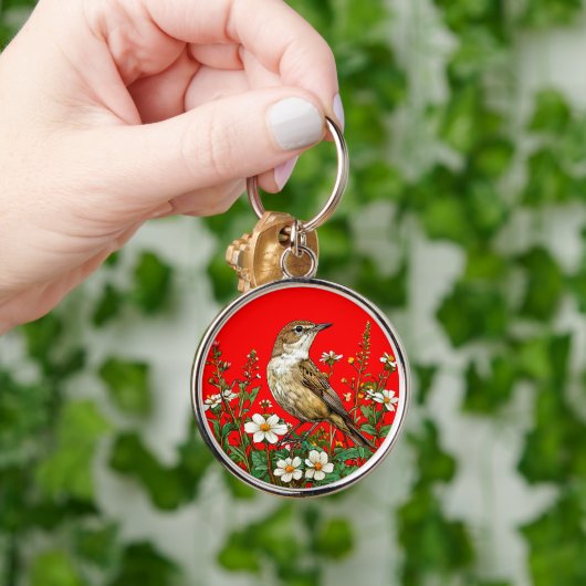 Europese rietzanger sleutelhanger (Hand)