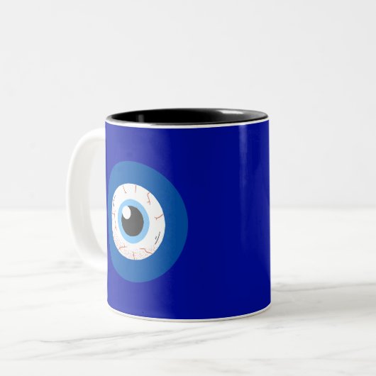 Evil Eye Max Ultra Tweekleurige Koffiemok (Voorkant links)
