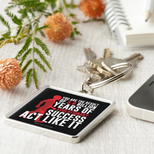 Evolutionair succes sleutelhanger (Zijkant)