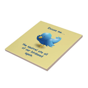 Excuseer me....de eekhoorn at al ons vogelzaad op tegeltje