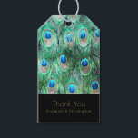 Exotische pauwenveren dank u cadeaulabel<br><div class="desc">Een gepersonaliseerd dank u geschenk label met een felgekleurd patroon van exotische en wilde pauwenveren in  blauwgroen,  juweelgroen,  aqua en kobaltblauw. Artistiek en fancy,  gemaakt met waterverven. Een chique en stijlvol design. Tekst is geschreven in een elegant gouden lettertype en zegt dank u met uw persoonlijke naam (en) hieronder.</div>