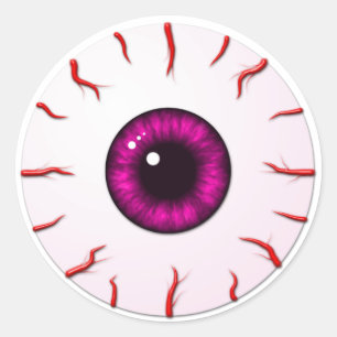 Eyeball met roze iris en rode vinnen ronde sticker