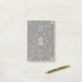 Falln leder en goud post-it® notes (Op bureau)
