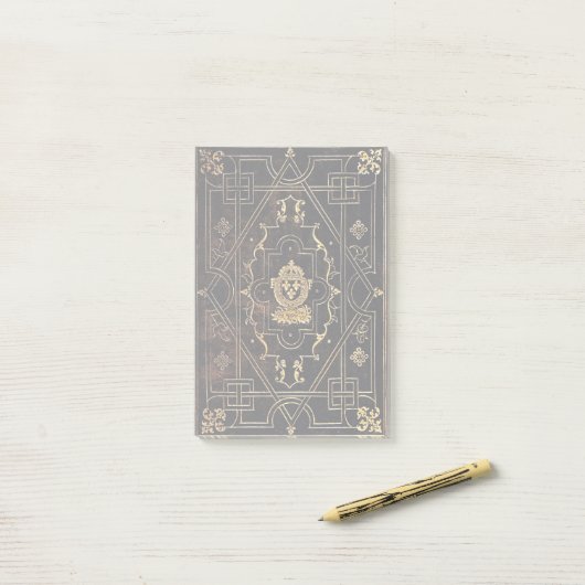 Falln leder en goud post-it® notes (Op bureau)