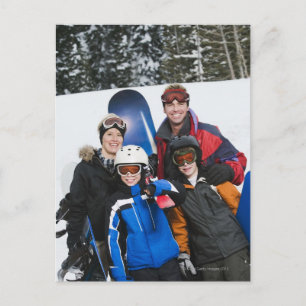 Familieportret met snowboards briefkaart