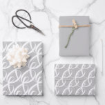 Fancy witte saamhorigheidssymbool op zilveren brui inpakpapier vel<br><div class="desc">Het ontwerp bevat een witte "togetherness"-tekst in een elegant en uniek patroon op een zilveren achtergrond,  om de speciale dag van de bruid en bruidegom te vieren. Het inpakpapier is ook geschikt voor verlovingen,  huwelijksjubileum,  Valentijnsdag,  Sweetest Day of elke andere gelegenheid om samenhorigheid en eenheid te vieren!</div>