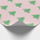 Fantastische groene kerstbomen op roze kerst cadeaupapier (Hoek)