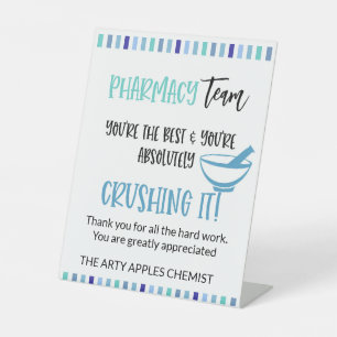 Farmaceutische groep bedankt reclamebord met voetstuk