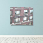 FATHER JOHN'S APOTHEEK GEBOUW OMWRAPT CANVAS AFDRUK (Insitu (Houten vloer))