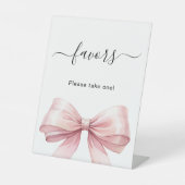 Favor teken roze strik wit reclamebord met voetstuk (Voorkant)