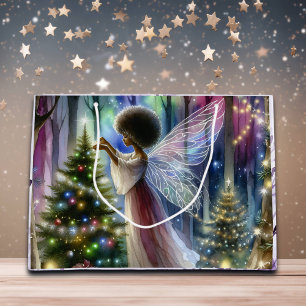 fee decoreren van de kerstboom groot cadeauzakje